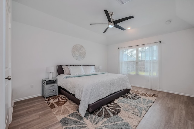 bedroom featuring ceiling fan and wood-type flooring