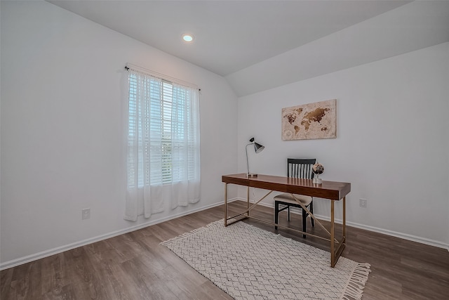 home office featuring wood-type flooring and lofted ceiling