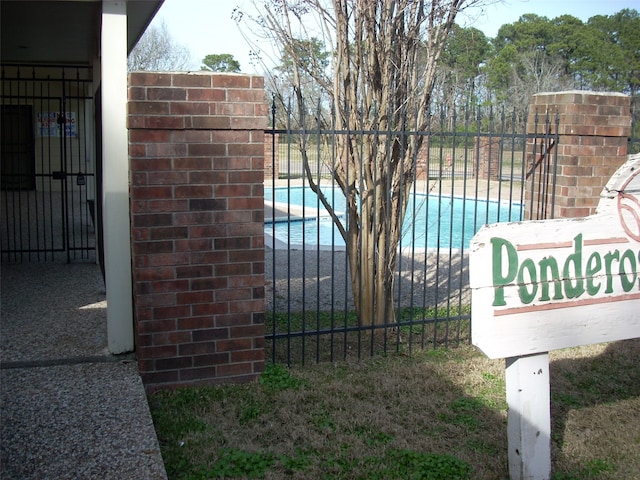 details featuring carpet and a pool