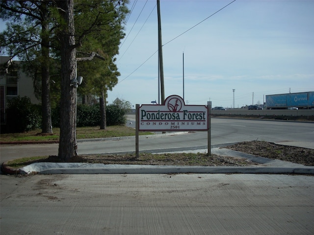 view of community sign