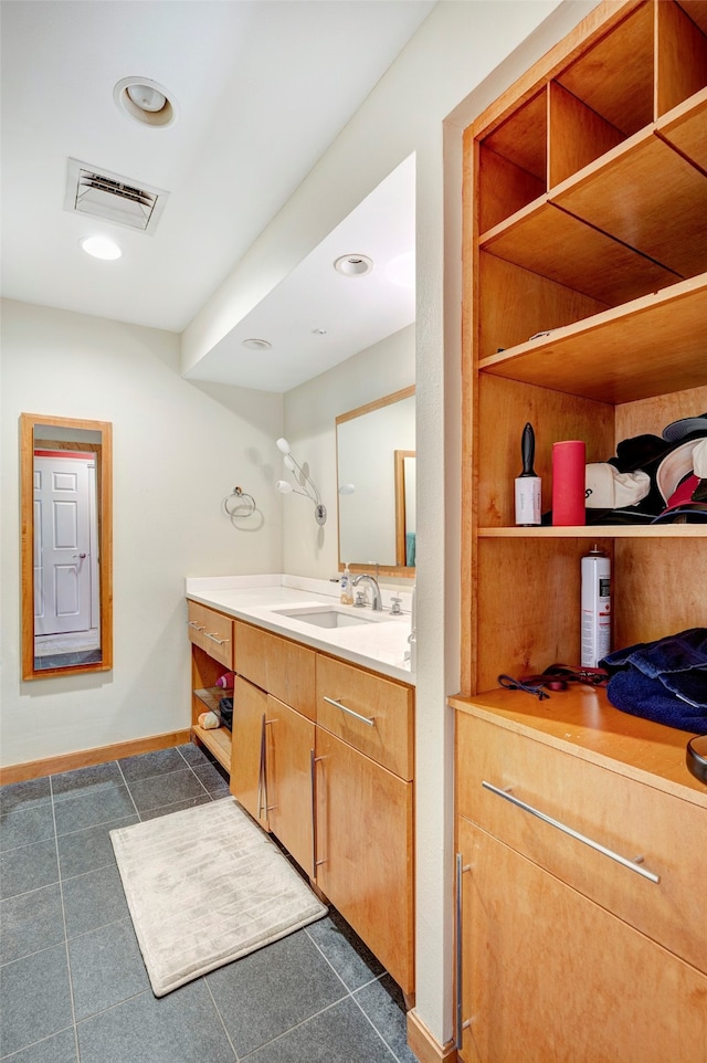 bathroom featuring vanity and tile patterned flooring