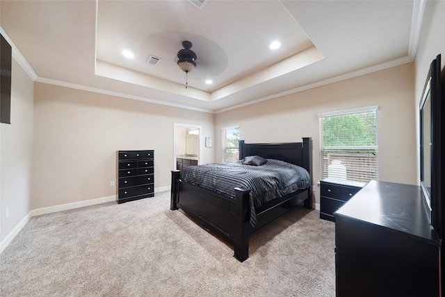 bedroom with multiple windows, ceiling fan, crown molding, and light colored carpet