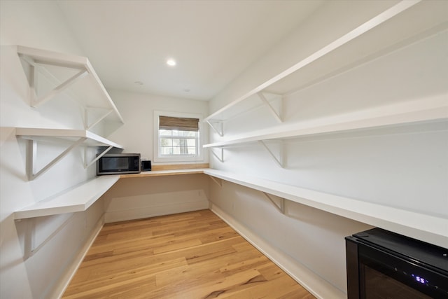 pantry featuring beverage cooler