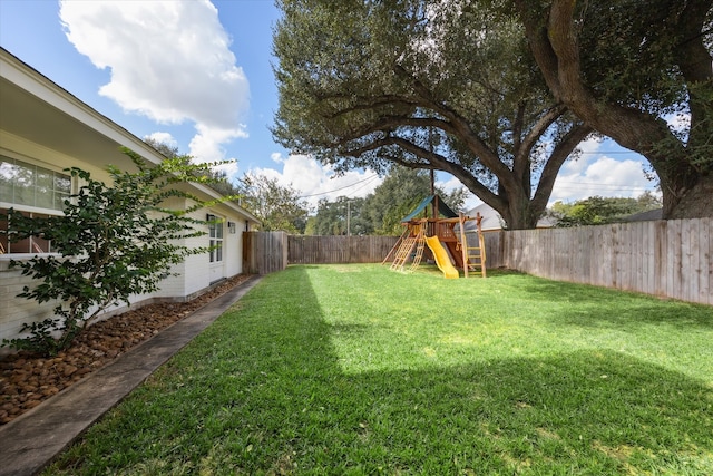 view of yard with a playground