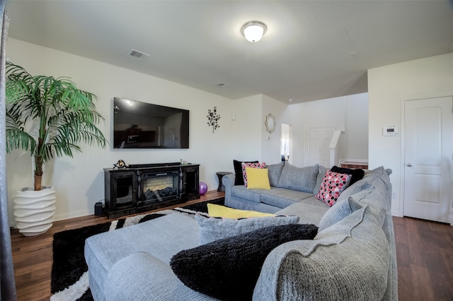 living room with dark wood-type flooring