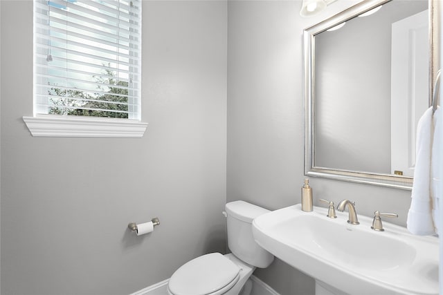 bathroom with sink and toilet