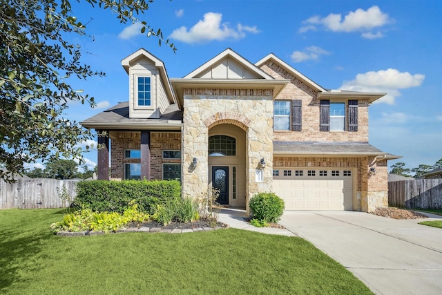 view of front facade with a front lawn and a garage