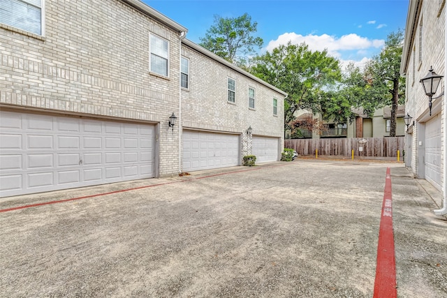 view of side of property featuring a garage