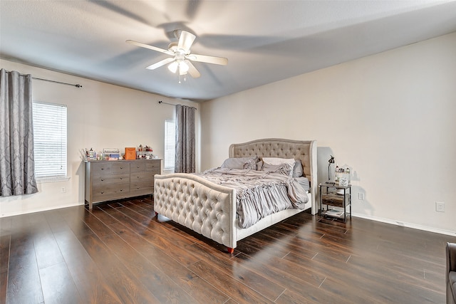 bedroom with dark wood-type flooring and ceiling fan