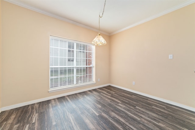 empty room featuring crown molding, a chandelier, and dark hardwood / wood-style flooring