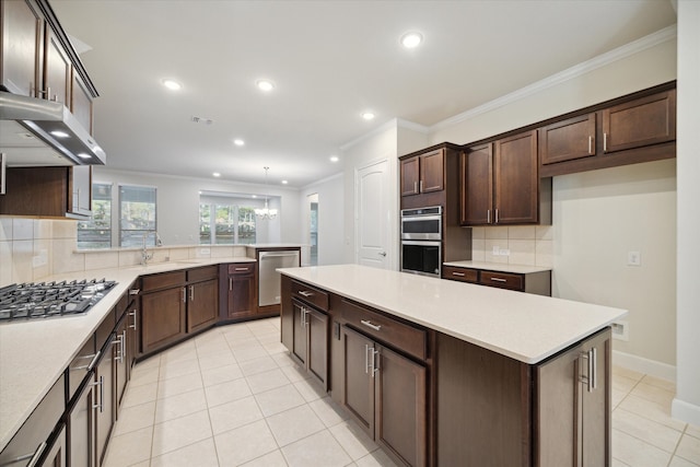 kitchen featuring appliances with stainless steel finishes, backsplash, dark brown cabinets, crown molding, and light tile patterned flooring