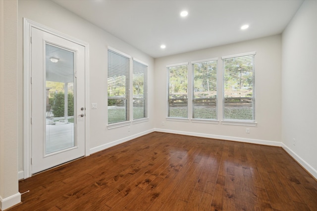 unfurnished sunroom with a healthy amount of sunlight