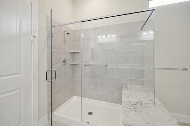 bathroom with walk in shower