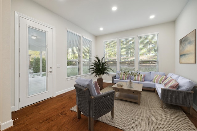 living room with dark hardwood / wood-style floors