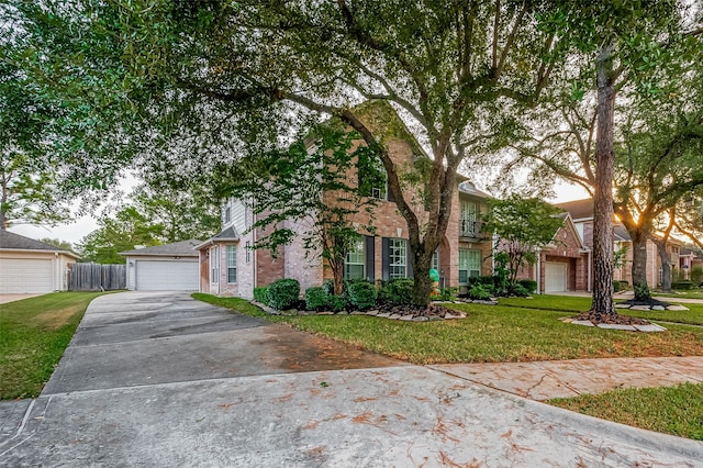 view of front of house featuring a front yard and a garage