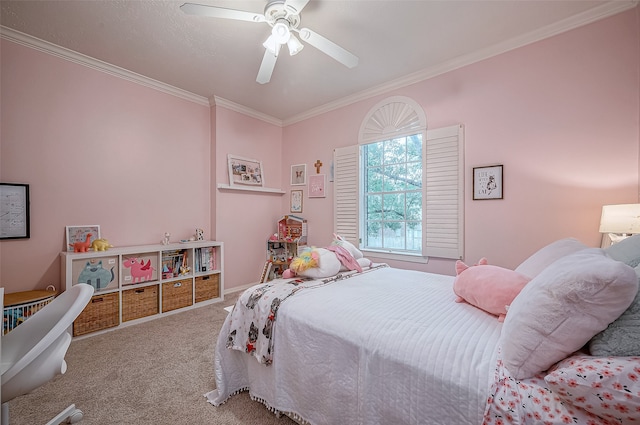 bedroom featuring ornamental molding, carpet, and ceiling fan