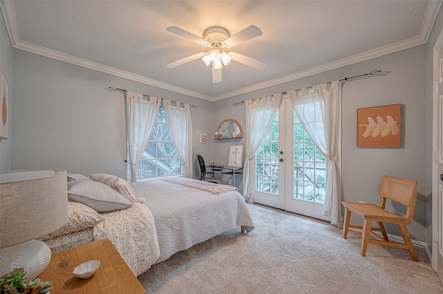 carpeted bedroom featuring french doors, ceiling fan, crown molding, and access to outside