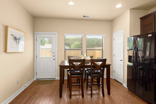 dining room featuring hardwood / wood-style flooring