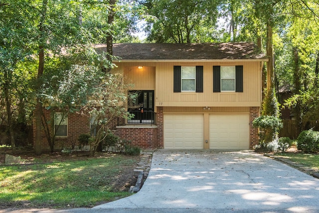 raised ranch featuring a garage