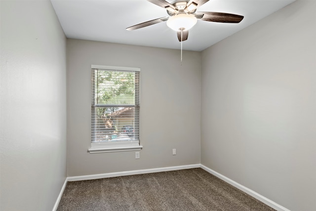 empty room featuring carpet flooring and ceiling fan