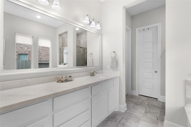 bathroom with vanity and walk in shower