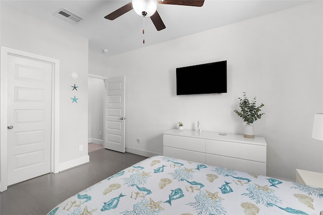 bedroom featuring dark wood-type flooring and ceiling fan