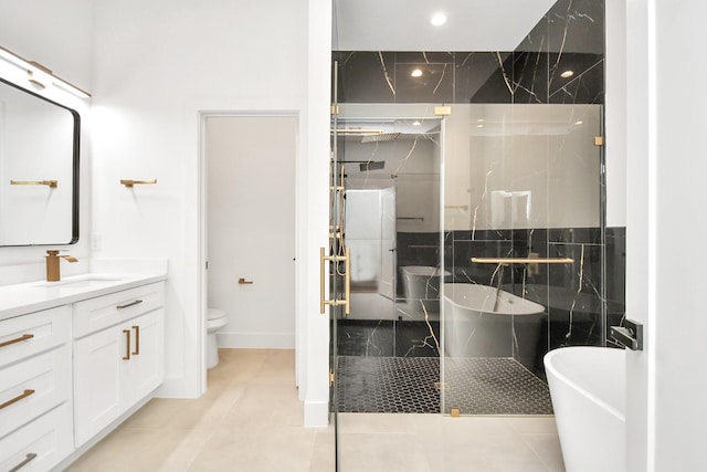 full bathroom featuring separate shower and tub, tile patterned flooring, vanity, and toilet