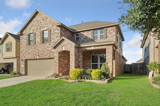 front of property featuring a front lawn and a garage