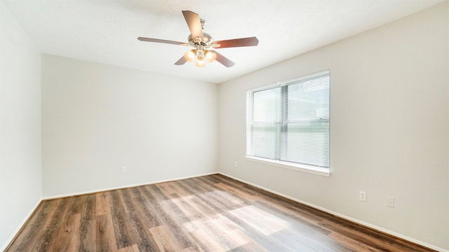 unfurnished room featuring hardwood / wood-style floors and ceiling fan