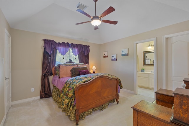 carpeted bedroom with ceiling fan, connected bathroom, and vaulted ceiling