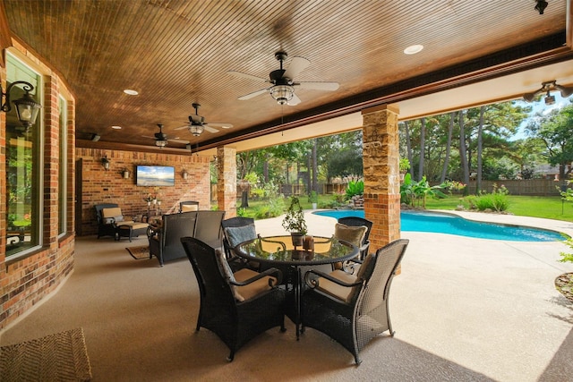 view of patio featuring a fenced in pool