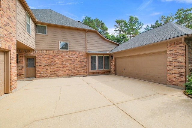 exterior space with a garage