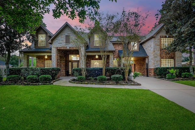 craftsman inspired home with a yard