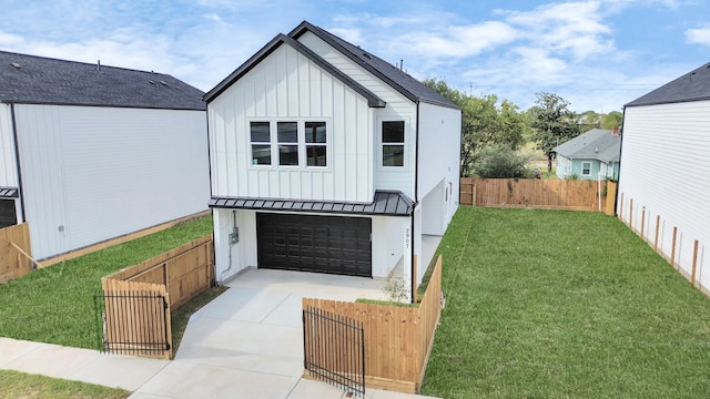 modern farmhouse style home featuring a front lawn and a garage