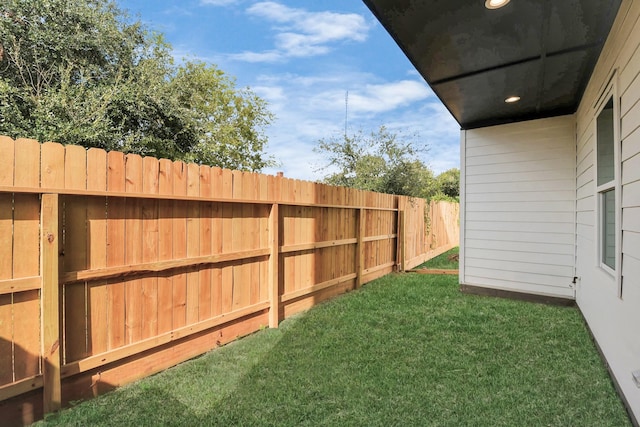 view of yard featuring fence