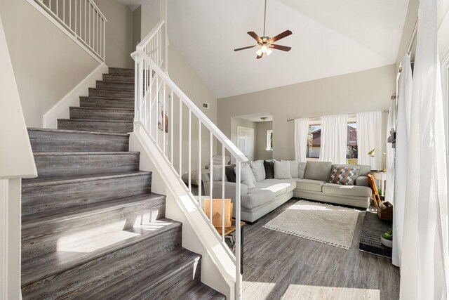 7415 Cavesson Dr, Cypress, TX 77433 - stairs featuring high vaulted ceiling, a ceiling fan, and wood finished floors