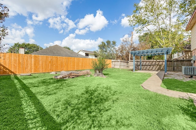 view of yard with a pergola and cooling unit