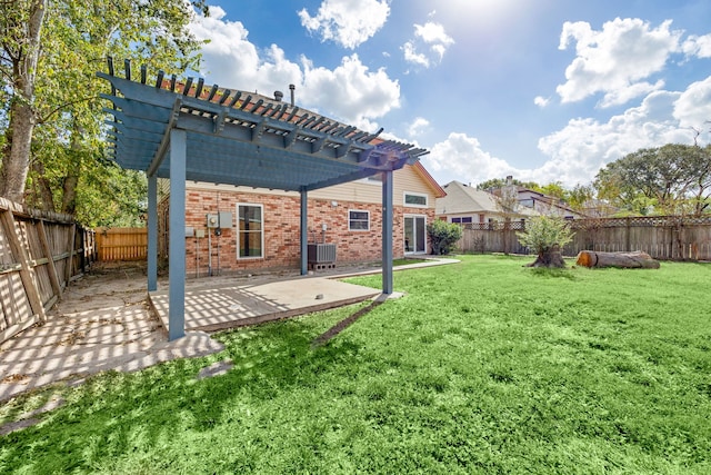 back of property with a yard, central air condition unit, a patio, and a pergola