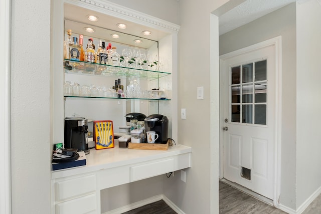 bar featuring hardwood / wood-style floors