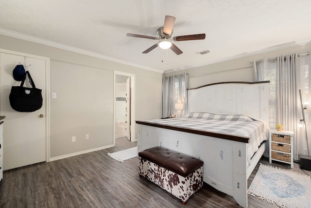 bedroom featuring ceiling fan, crown molding, a textured ceiling, and dark hardwood / wood-style floors