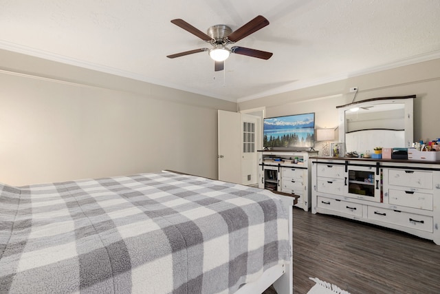 bedroom with dark wood-type flooring, crown molding, and ceiling fan