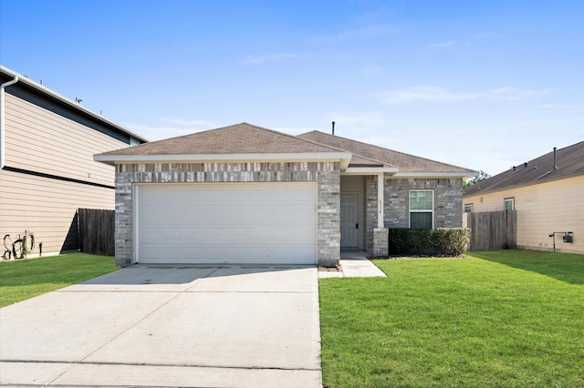 ranch-style home with a front yard and a garage