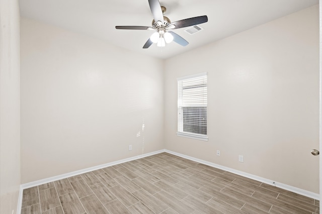 unfurnished room featuring light hardwood / wood-style floors and ceiling fan