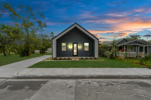 view of front of home featuring a yard