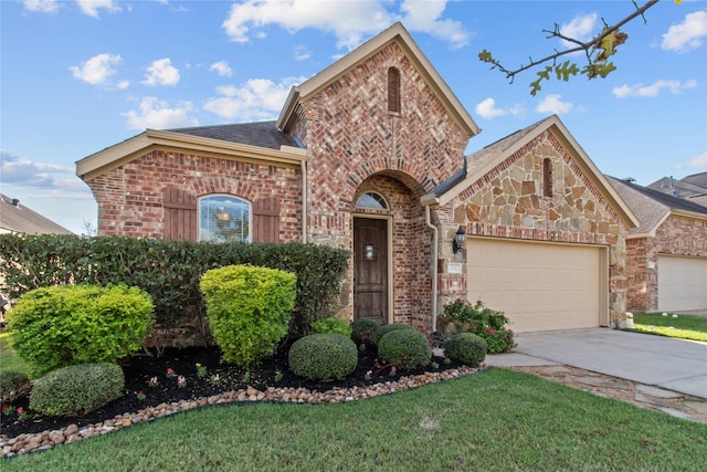 view of front of home with a garage