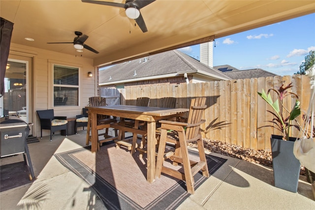 view of patio featuring ceiling fan