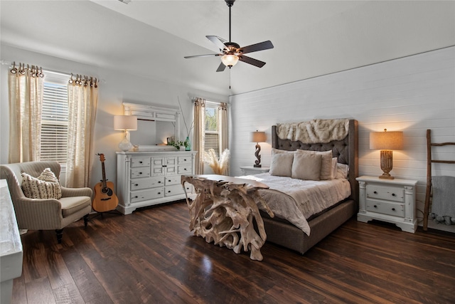 bedroom featuring ceiling fan and dark wood-type flooring