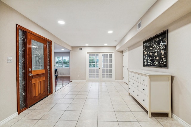 3227 Audley St, Houston, TX 77098 - entrance foyer with french doors, recessed lighting, and light tile patterned flooring