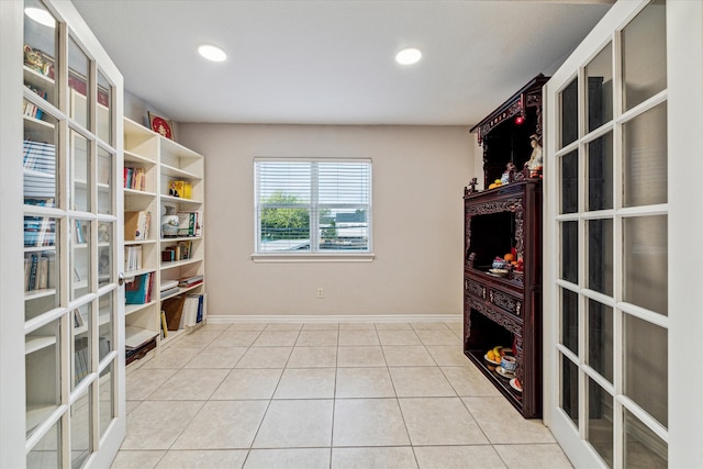 interior space with light tile patterned floors