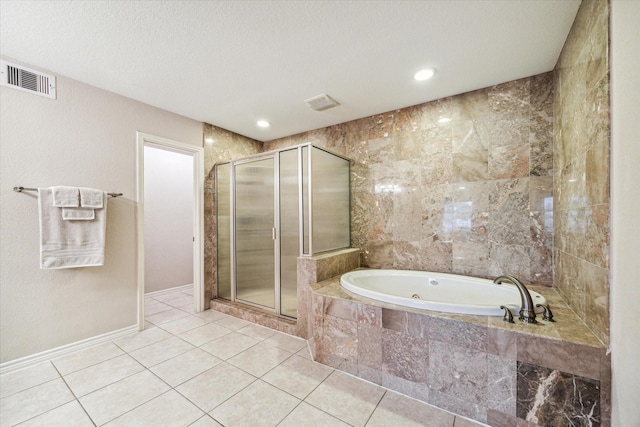 3227 Audley St, Houston, TX 77098 - bathroom featuring a whirlpool tub, tile patterned flooring, a shower stall, a textured ceiling, and recessed lighting